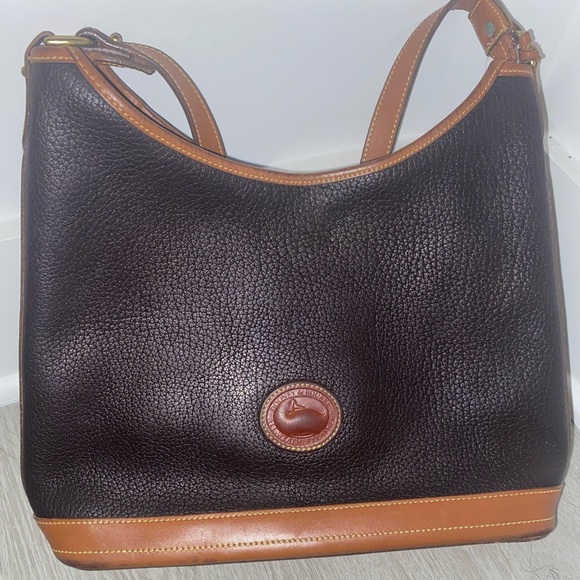 Dooney & Bourke Handbags - Genuine leather black and brown classic shoulder bag. Used